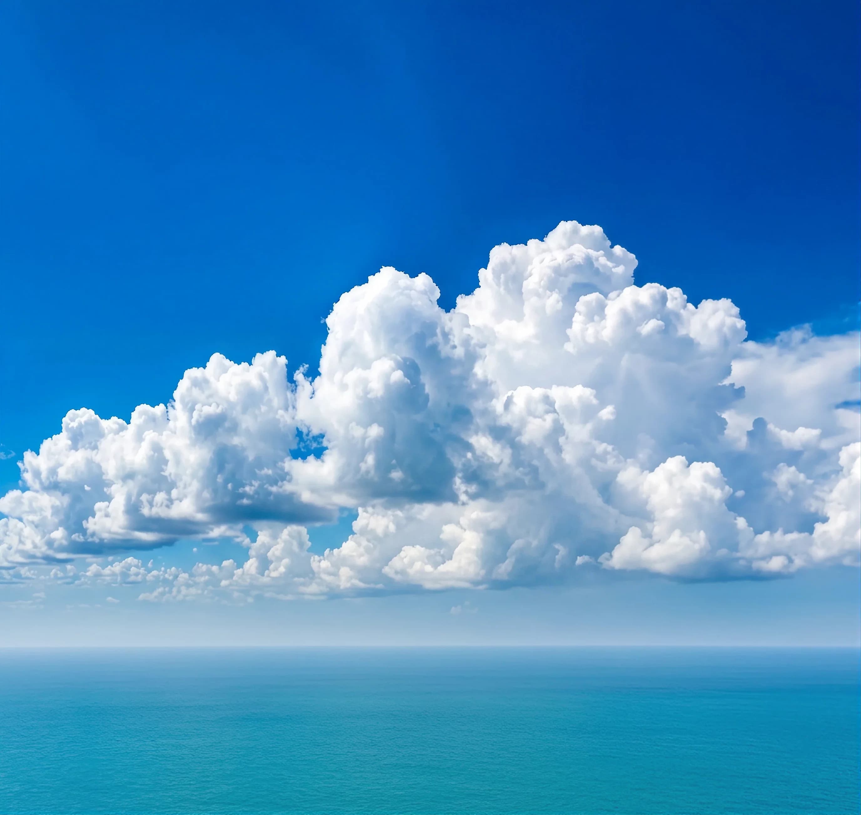 Open sky and cloud over an island shore — the horizon the first Alpha city is built under